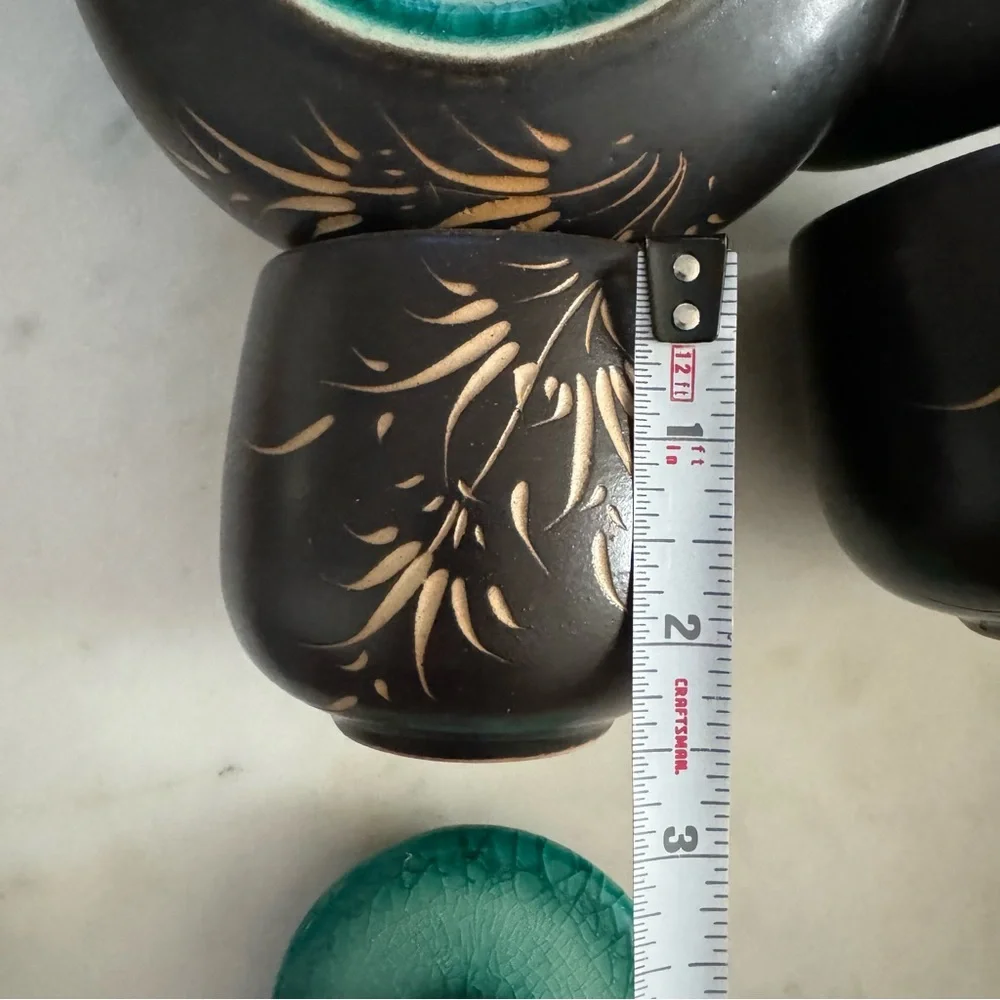 Carved Vietnamese tea kettle set with 2 small tea cups